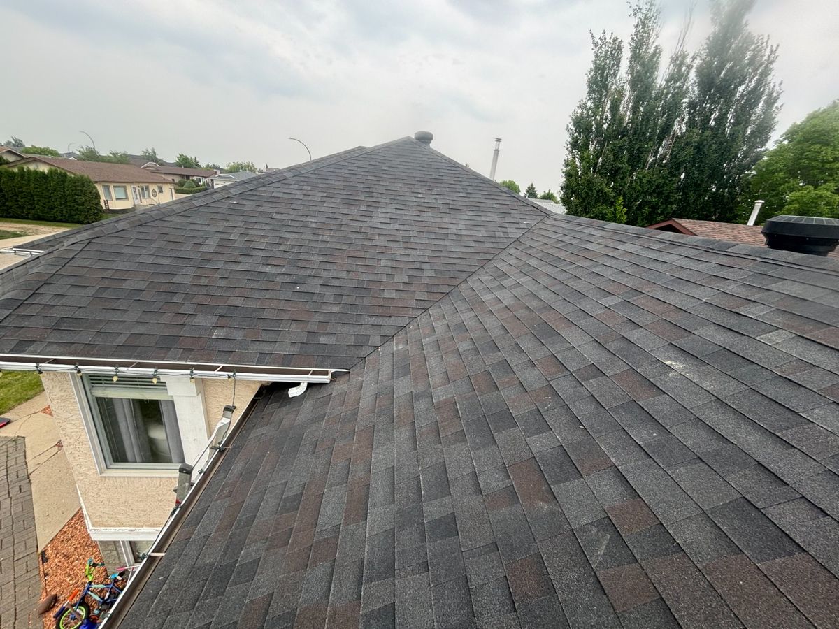 Completed dark hip roof overlooking Yorkton neighbourhood