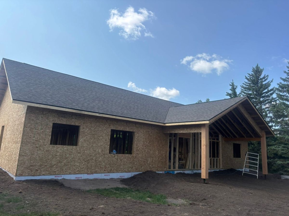 New construction with timber gable porch and Resisto underlayment