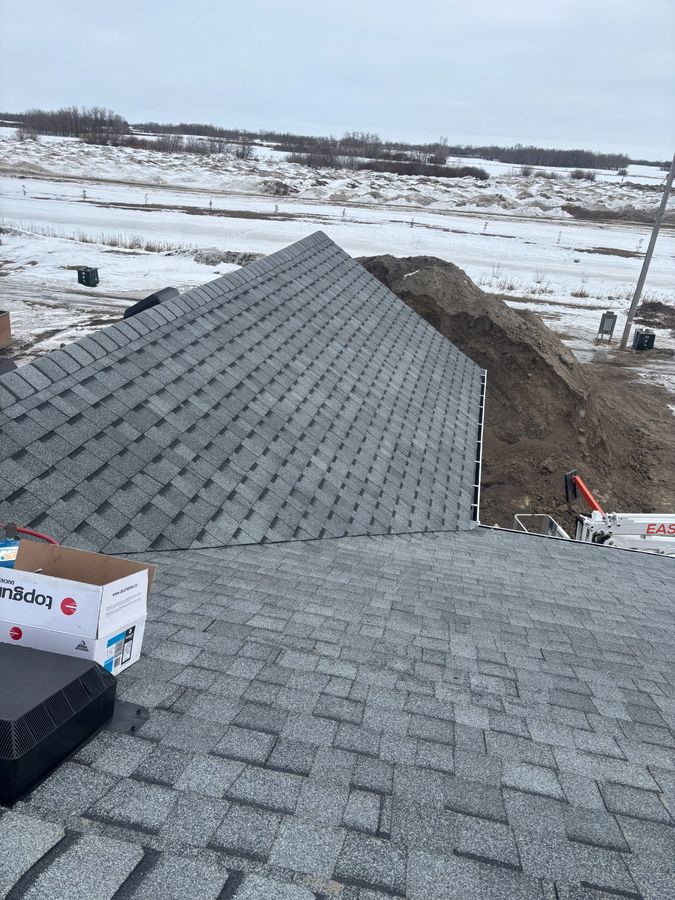 Winter roof with box vents and snowy Saskatchewan prairie